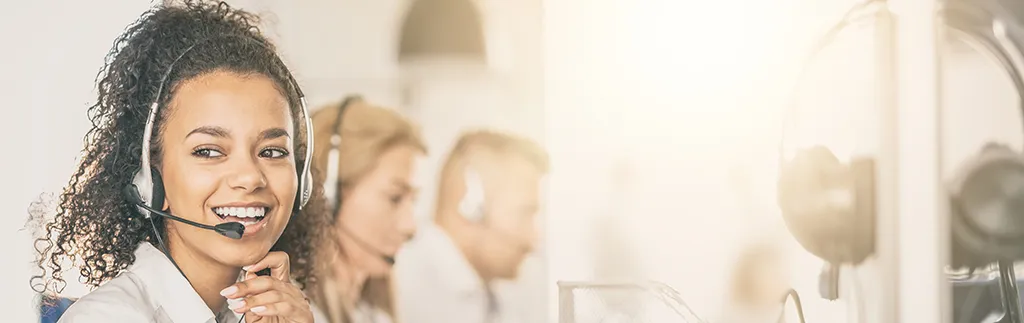 International nurse staffing recruiter smiling while working